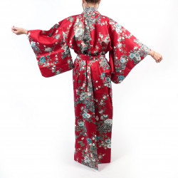 Kimono rosso tradizionale giapponese da donna con peonia e fiori di ciliegio