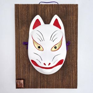 Masque nô représentant un renard kitsune blanc en céramique avec un cadre en bois